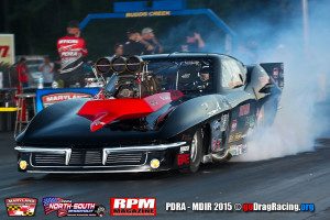 Gerry Capano fires through an awesome burnout in his split racing Corvette pro mod