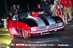 Chuck Mohn's Gorgeous Pro Mod Camaro lighting the pipes on the hit