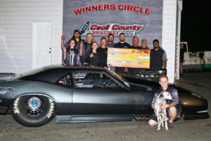 Chuch Ulsch in winners circle at Cecil County Dragway At the Strange Engineering Street Car Shootout with NEOPMA Pro Mods
